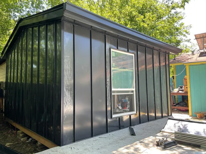 Black standing seam metal wall panels for Metal Roof Installation in Struthers