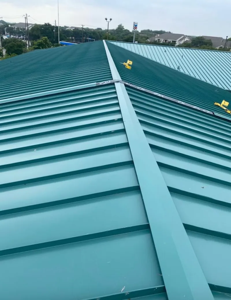 Green commercial metal roof ridge and valley for Metal Roof Repair in Struthers