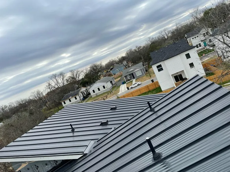 Standing seam metal roof panels with vents for Skylight Repair in Struthers